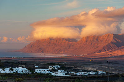 Scenic view of landscape against sky during sunset