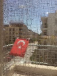 Heart shape seen through glass window