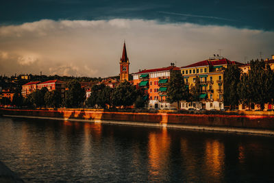 Illuminated city at waterfront