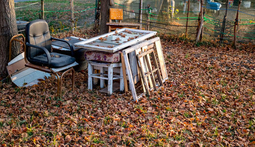 A table and chair made of scraps in the garden