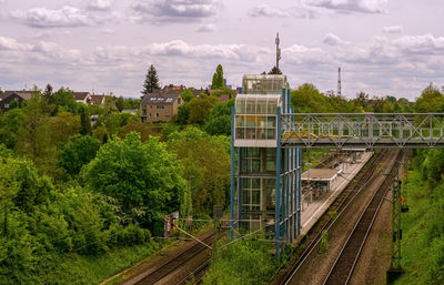 Train on railroad tracks against sky