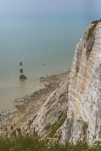 Scenic view of calm sea against blue sky