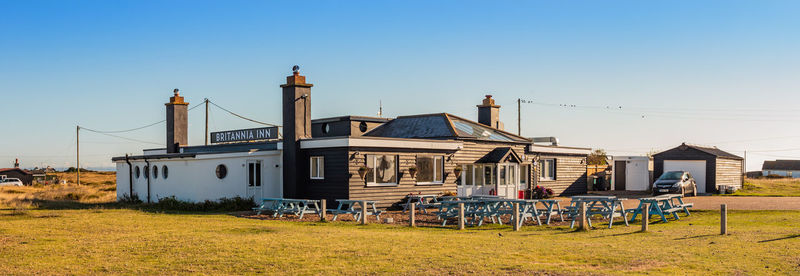 Built structure on field against clear sky