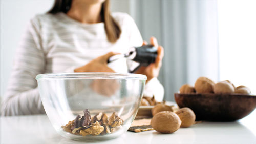 Midsection of woman preparing food