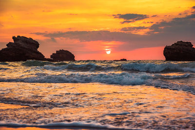 Scenic view of sea against sky during sunset