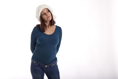 Portrait of a beautiful young woman over white background