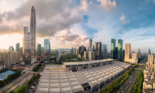 Panoramic view of buildings in city against sky