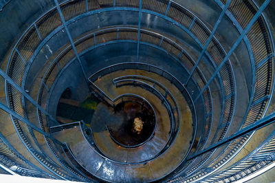 Directly below shot of spiral staircase of building