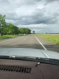 Road seen through car windshield