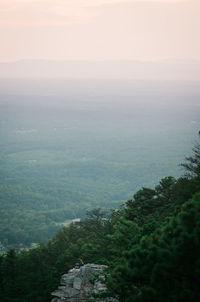 Scenic view of tree mountains against sky