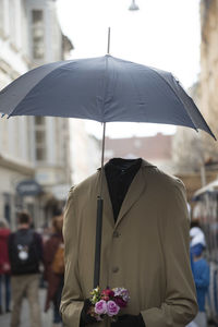 An umbrella as a protection agains rain on the outside