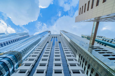 Low angle view of modern buildings against sky