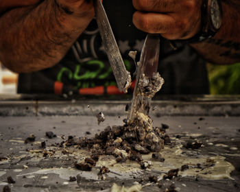 Midsection of person working