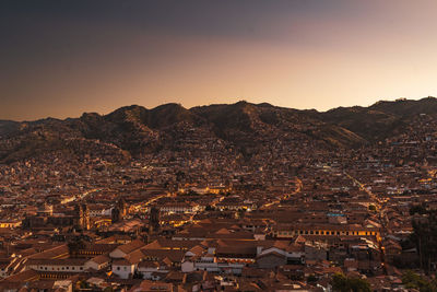 High angle view of townscape against sky during sunset