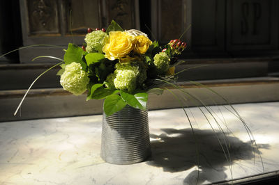 Rose flower vase on table