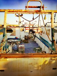 Fishing boat moored in water