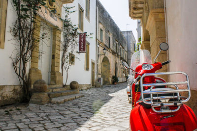 Red bicycle in city