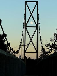 Low angle view of bridge against clear sky