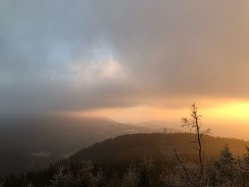 Scenic view of landscape against sky during sunset