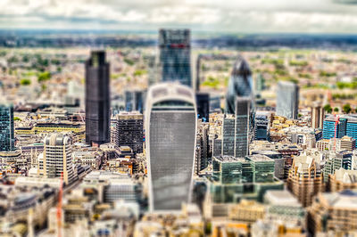 Tilt-shift image of modern buildings in city