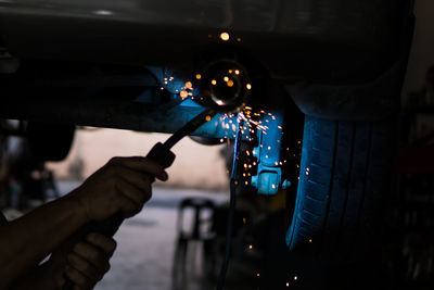 Close-up of hand holding machine