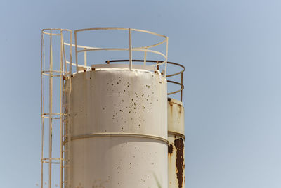 Low angle view of lighthouse against clear sky