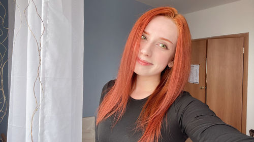 Portrait of beautiful woman at home