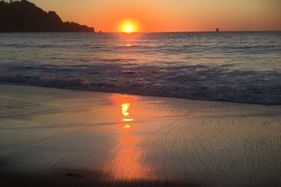 Scenic view of sea against sky during sunset