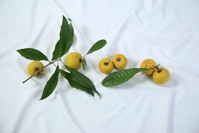 High angle view of fruits on bed