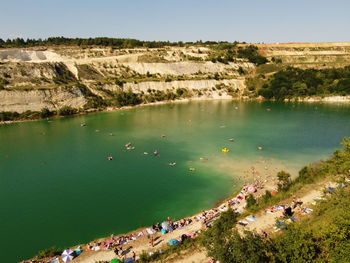 High angle view of lake amidst trees