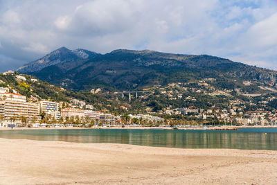 Scenic view of beach against mountain