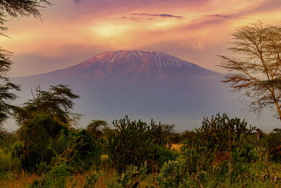 Scenic view of mountains against sky during sunset