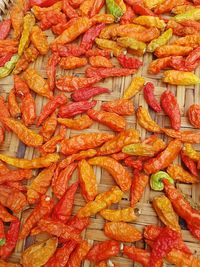 Full frame shot of red chili peppers for sale at market