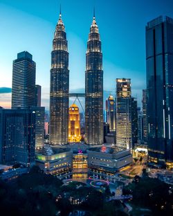 Modern buildings in city at dusk