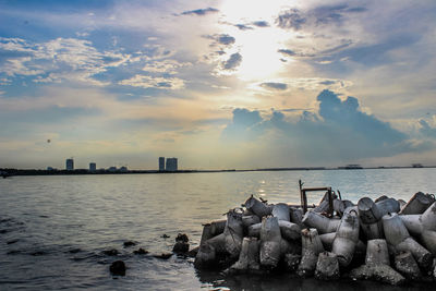 Scenic view of sea against sky during sunset