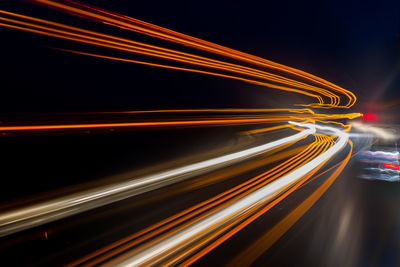 Light trails on road at night