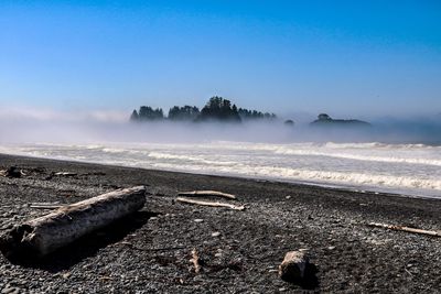 Scenic view of sea against sky during winter