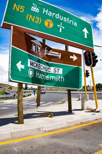 Information sign on road in city