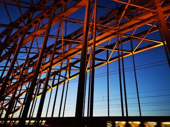 Railway bridge at sunset, architecture detail, magic colors, train crossing, cologne-germany