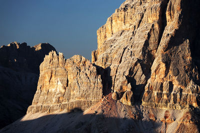 Scenic view of rocky mountains against clear sky