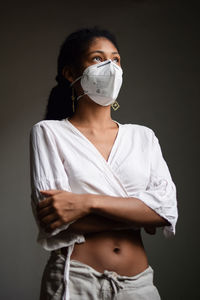 Young woman with a face mask