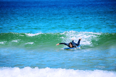 Man swimming in sea