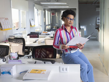 Young woman working in office