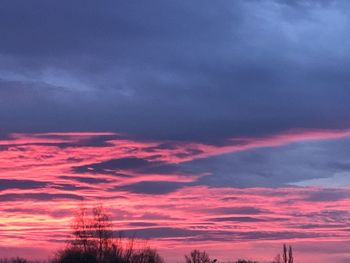 Low angle view of dramatic sky during sunset