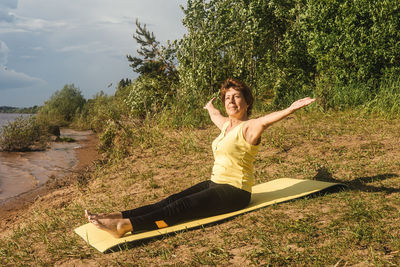 Full length of senior woman in park