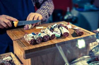 Close-up of cropped hand holding food