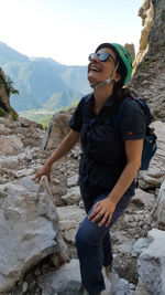 Portrait of man standing on rock