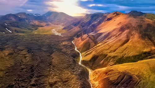 Panoramic view of  the river in  mountains with sunset, nordic islands,greenland,faroer,iceland 