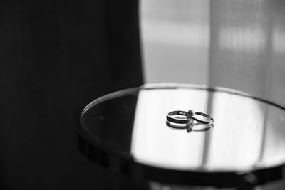 Close-up of ring on table at home
