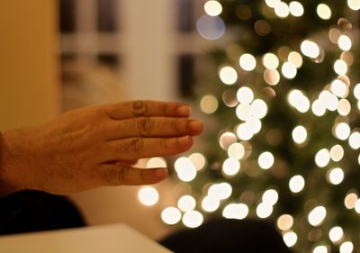 Cropped image of hand holding glass